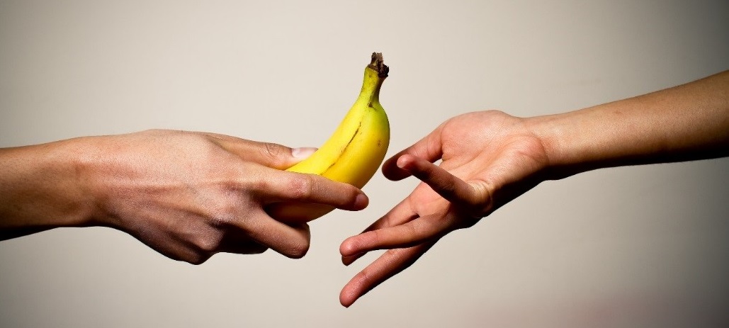 banana and hand